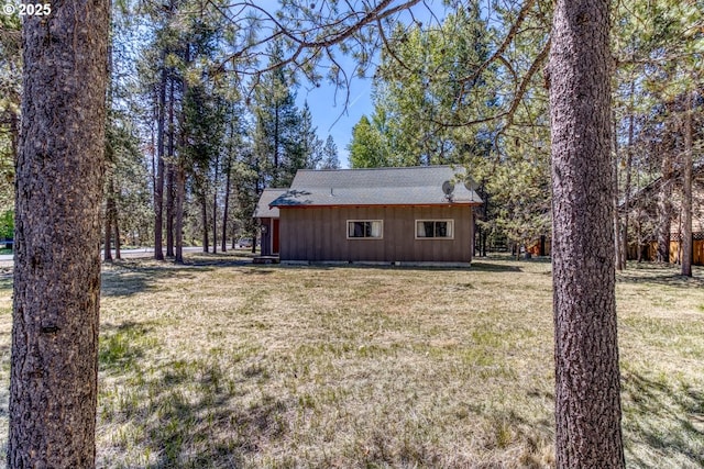 56095 Black Duck Rd, Bend, OR 97707 - view of property exterior with a lawn