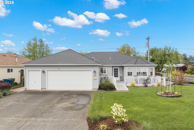 2097 Heather Way, Woodburn, OR 97071 - ranch-style house featuring driveway, a front yard, a garage, roof with shingles, and a porch