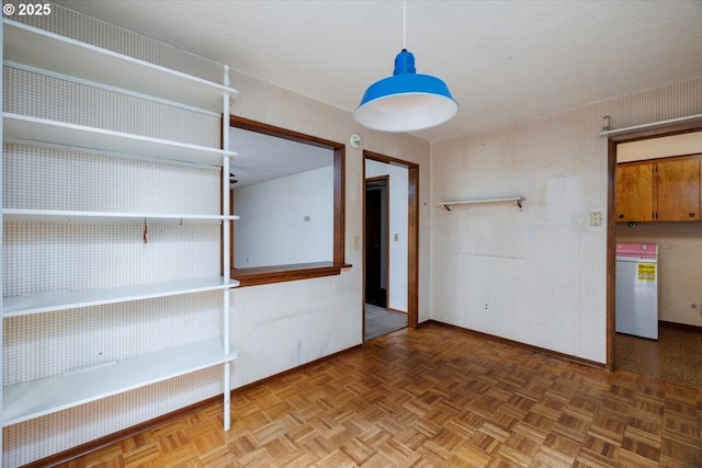 7450 SW Wilson Ave, Beaverton, OR 97008 - unfurnished room with baseboards and washer / clothes dryer