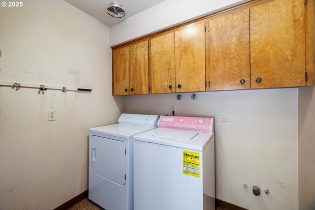 7450 SW Wilson Ave, Beaverton, OR 97008 - laundry room with cabinet space, washing machine and dryer, and baseboards