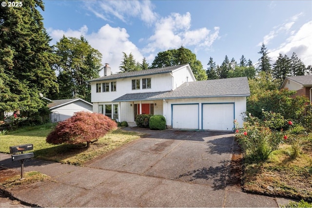 7450 SW Wilson Ave, Beaverton, OR 97008 - traditional home featuring an attached garage, driveway, and a chimney