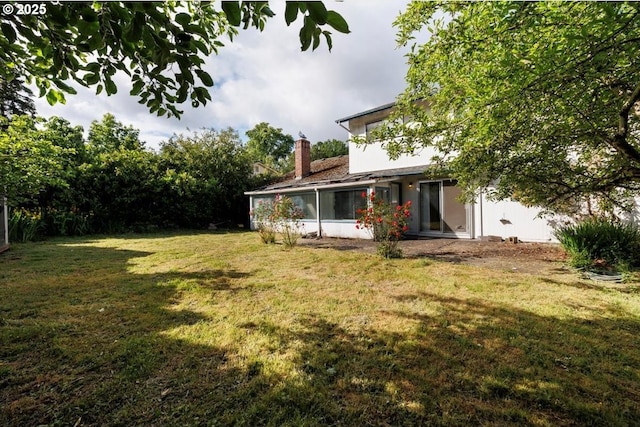 7450 SW Wilson Ave, Beaverton, OR 97008 - view of grassy yard featuring a sunroom