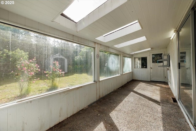7450 SW Wilson Ave, Beaverton, OR 97008 - unfurnished sunroom with a skylight and lofted ceiling
