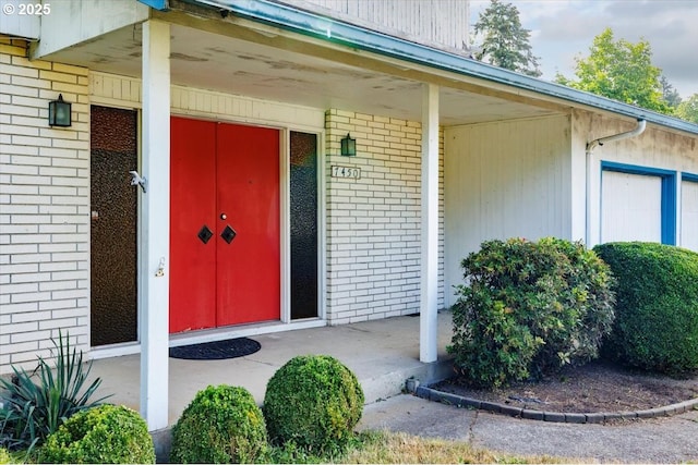 7450 SW Wilson Ave, Beaverton, OR 97008 - entrance to property featuring brick siding and covered porch