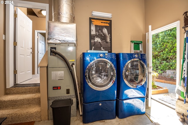 laundry area featuring laundry area and washing machine and clothes dryer