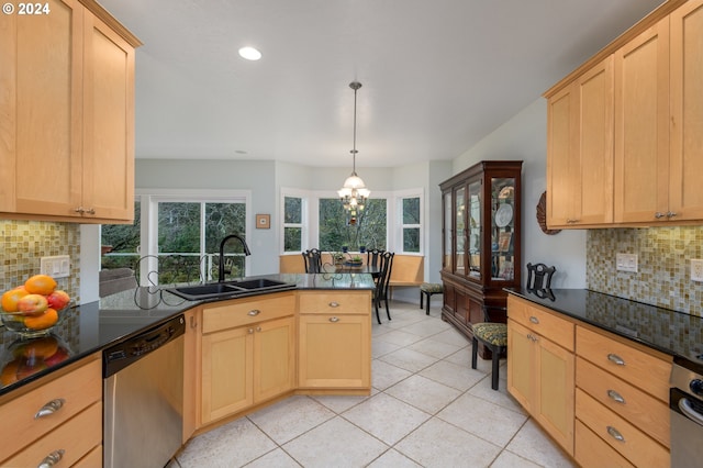 kitchen with light tile patterned floors, a sink, hanging light fixtures, stainless steel dishwasher, and light brown cabinetry