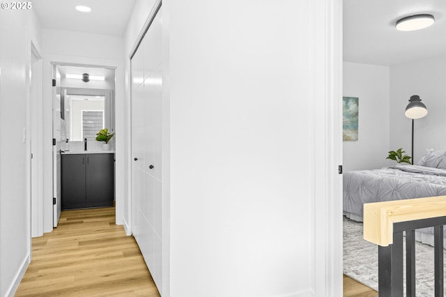 3528 NE 44th Ave, Portland, OR 97212 - hallway featuring light wood-type flooring and recessed lighting