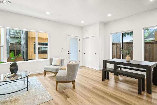 3528 NE 44th Ave, Portland, OR 97212 - living area featuring light wood-style flooring, recessed lighting, and baseboards