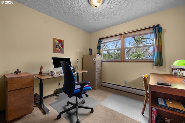 office with a baseboard heating unit, carpet flooring, and a textured ceiling