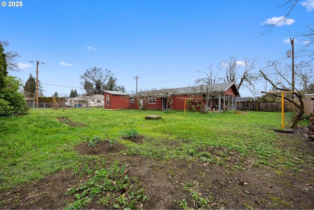 view of yard with fence