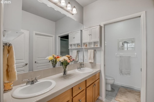 6395 Summerlinn Way W, Linn, OR 97068 - bathroom featuring double vanity and toilet