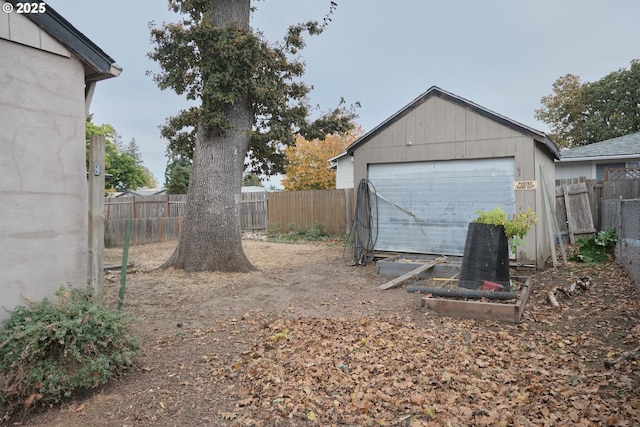 detached garage with fence