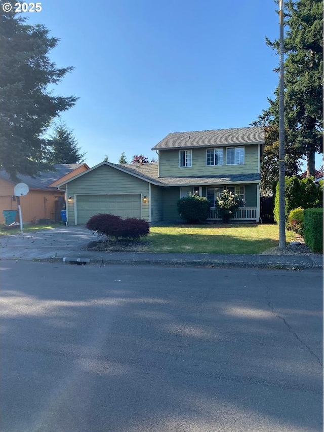 12708 NE 46th St, Vancouver, WA 98662 - view of front of home featuring a garage, a front lawn, and concrete driveway