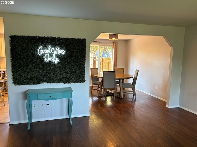 12708 NE 46th St, Vancouver, WA 98662 - dining area featuring arched walkways and wood finished floors