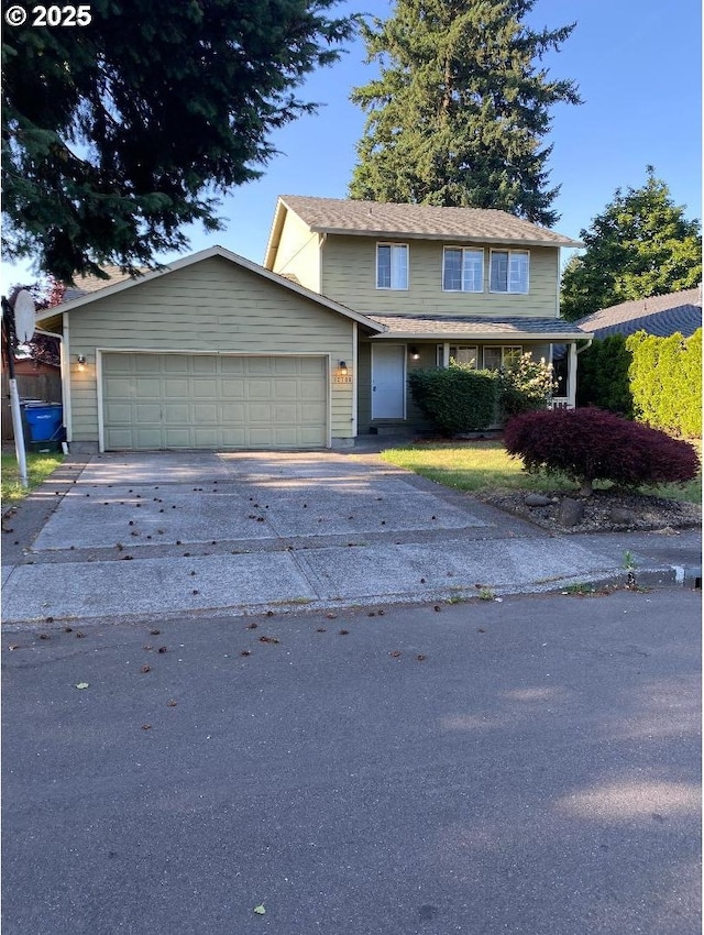 12708 NE 46th St, Vancouver, WA 98662 - traditional home with asphalt driveway and a garage