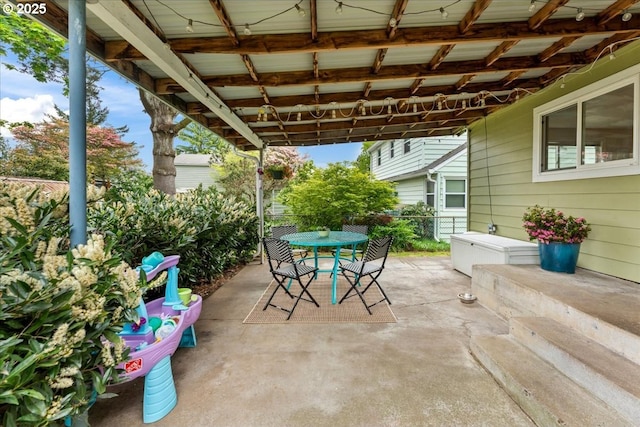 view of patio / terrace with fence and outdoor dining area