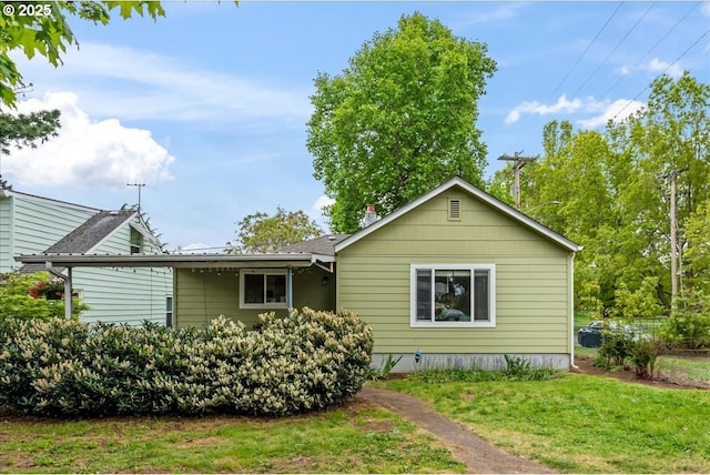 exterior space with a front yard