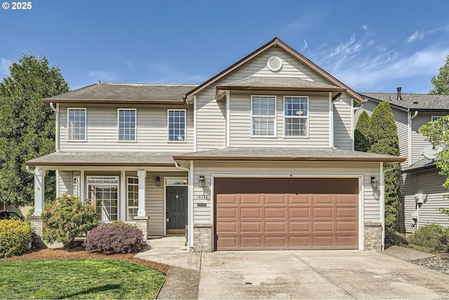 10304 NE 109th Ave, Vancouver, WA 98662 - view of front of house featuring a garage and concrete driveway