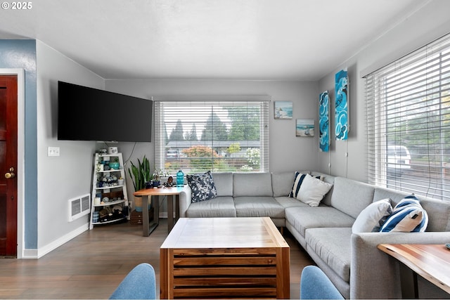 1090 Maple Dr, Eugene, OR 97404 - living area featuring dark wood-style flooring and baseboards
