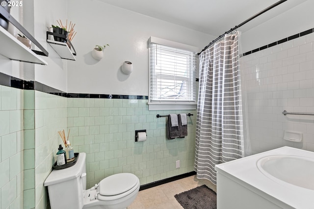 1090 Maple Dr, Eugene, OR 97404 - full bathroom with tile walls, toilet, tile patterned flooring, vanity, and curtained shower