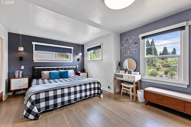 1090 Maple Dr, Eugene, OR 97404 - bedroom with hardwood / wood-style floors and baseboards