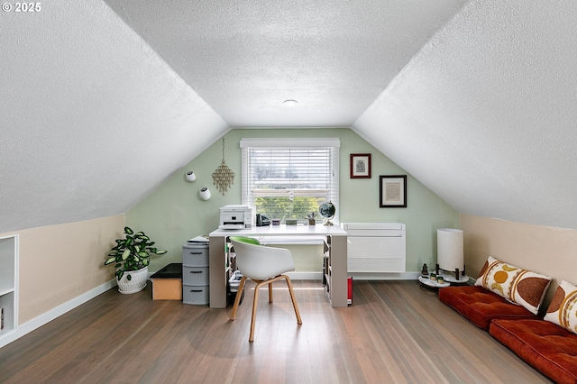1090 Maple Dr, Eugene, OR 97404 - office area with a textured ceiling, wood finished floors, baseboards, and lofted ceiling