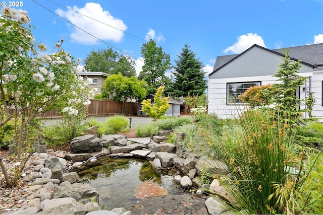 1090 Maple Dr, Eugene, OR 97404 - view of yard with a small pond