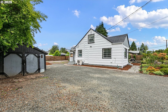 1090 Maple Dr, Eugene, OR 97404 - rear view of property featuring roof with shingles
