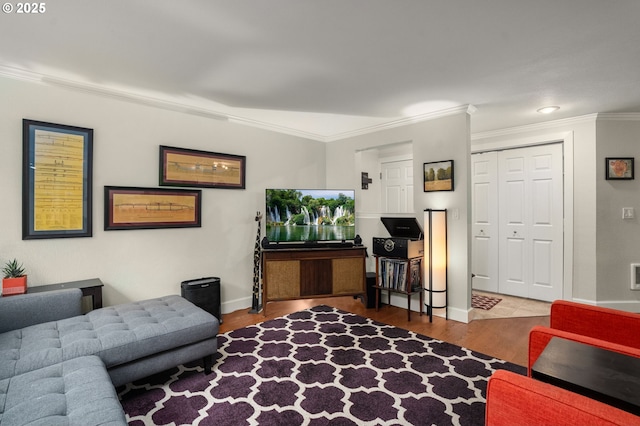 living room featuring wood-type flooring and ornamental molding