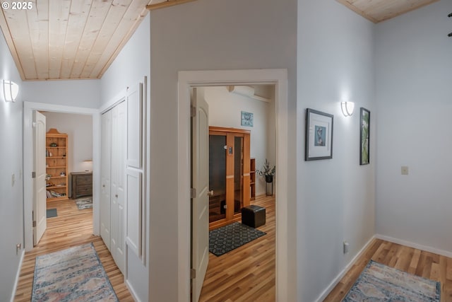 23830 Old Peak Rd, Philomath, OR 97370 - corridor featuring wood finished floors, wood ceiling, and baseboards