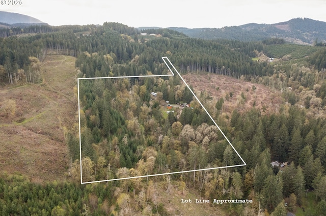 23830 Old Peak Rd, Philomath, OR 97370 - aerial overview of property's location with a heavily wooded area, mountains, and property boundaries highlighted