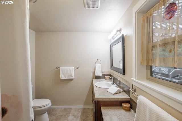 23830 Old Peak Rd, Philomath, OR 97370 - half bath featuring vanity, baseboards, and toilet
