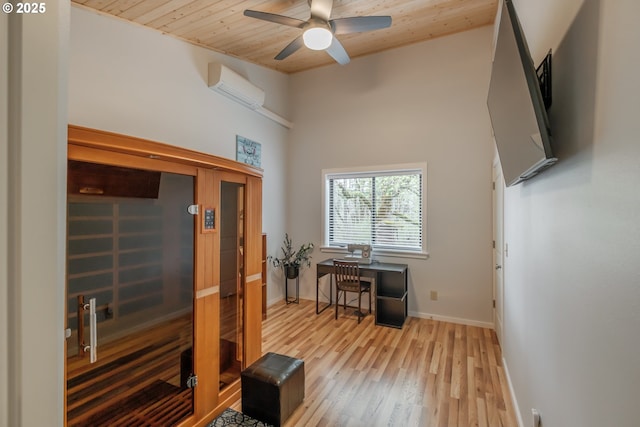 23830 Old Peak Rd, Philomath, OR 97370 - home office featuring wood finished floors, ceiling fan, wooden ceiling, a wall mounted air conditioner, and baseboards