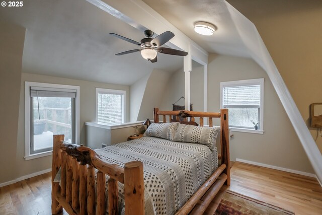 23830 Old Peak Rd, Philomath, OR 97370 - bedroom featuring lofted ceiling, wood finished floors, and baseboards