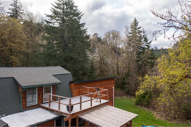 23830 Old Peak Rd, Philomath, OR 97370 - back of property with a wooden deck, a shingled roof, and a wooded view