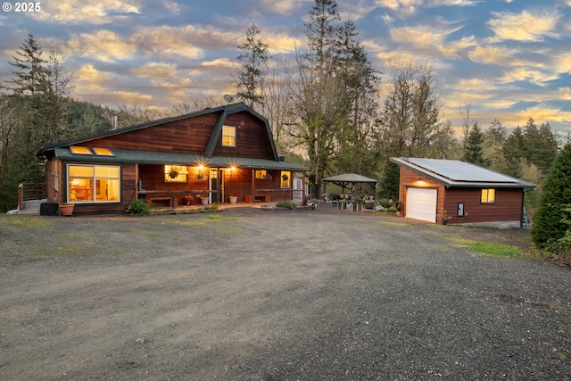 23830 Old Peak Rd, Philomath, OR 97370 - view of front facade with covered porch, an outbuilding, a garage, and a gazebo