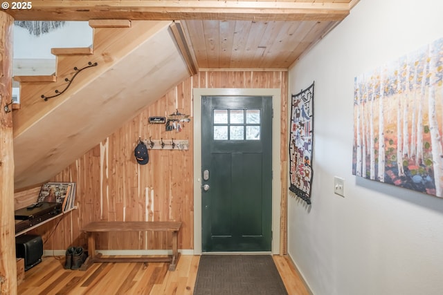 23830 Old Peak Rd, Philomath, OR 97370 - entryway with wood finished floors, wood walls, baseboards, vaulted ceiling, and wooden ceiling