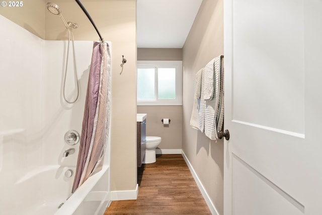 4607 SE 88th Ave, Portland, OR 97266 - bathroom with baseboards, toilet, shower / bathtub combination with curtain, and wood finished floors