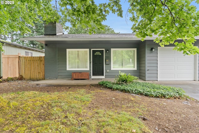 4607 SE 88th Ave, Portland, OR 97266 - view of front of property featuring an attached garage, a chimney, covered porch, and concrete driveway