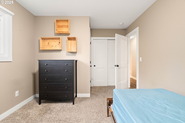 4607 SE 88th Ave, Portland, OR 97266 - bedroom featuring light carpet, baseboards, and a closet