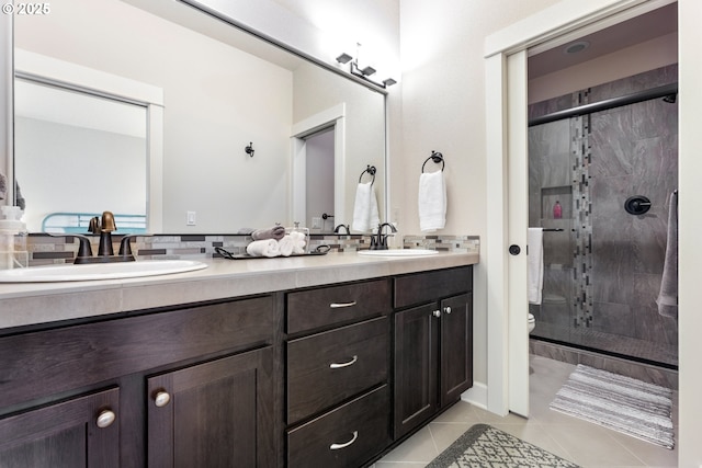 16033 SW 2nd St, Sherwood, OR 97140 - bathroom featuring tile patterned floors, double vanity, a shower stall, and toilet