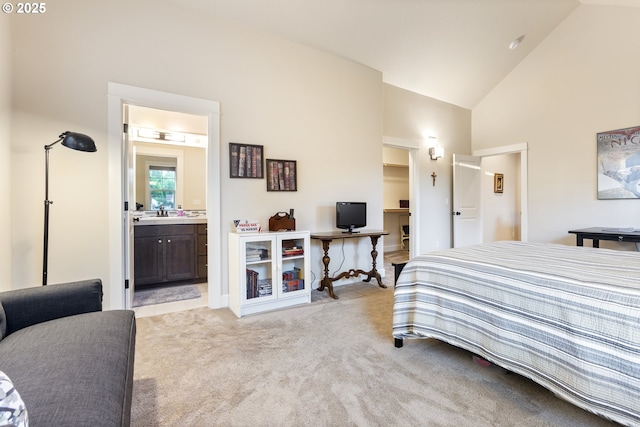 16033 SW 2nd St, Sherwood, OR 97140 - bedroom featuring light carpet, high vaulted ceiling, a spacious closet, ensuite bathroom, and a sink