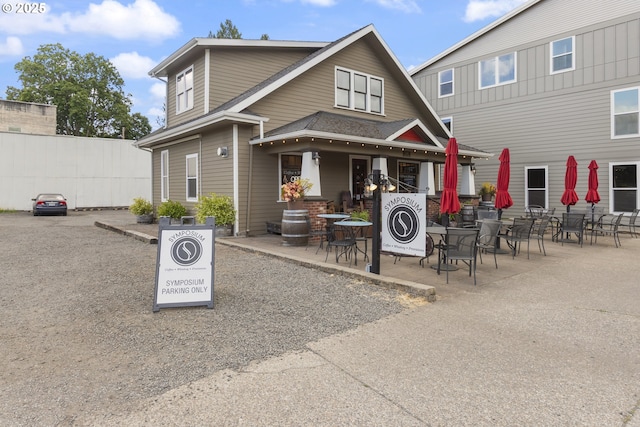 16033 SW 2nd St, Sherwood, OR 97140 - view of front of home with a patio and outdoor dining area