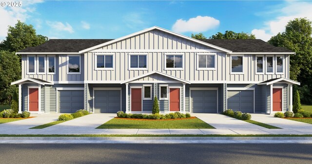 townhome / multi-family property with a garage