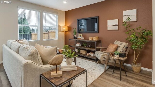 living area with wood-type flooring