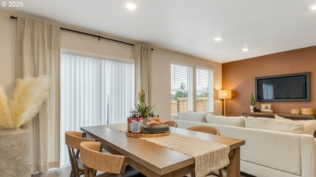 dining area with light hardwood / wood-style floors