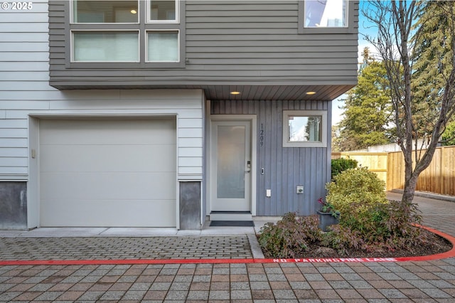 property entrance featuring a garage