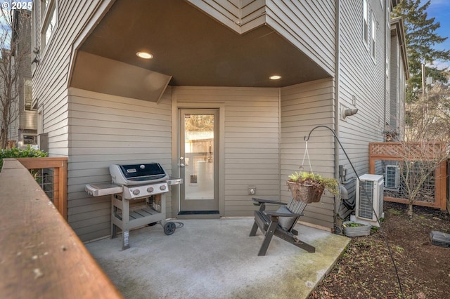 view of patio / terrace featuring central AC unit and grilling area