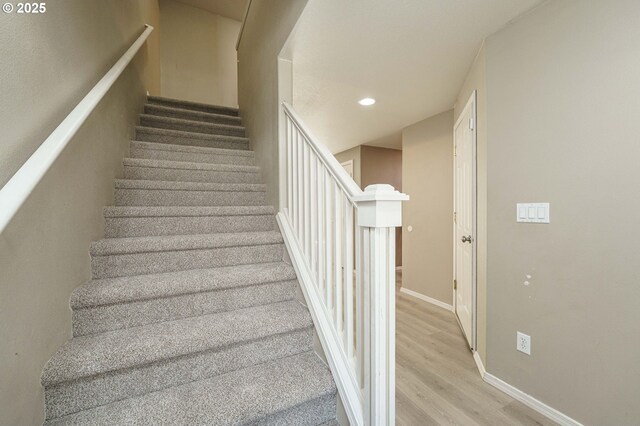 13924 NE 7th Ct, Vancouver, WA 98685 - stairs featuring wood finished floors, recessed lighting, and baseboards