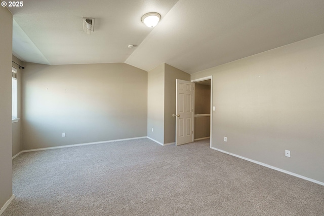 13924 NE 7th Ct, Vancouver, WA 98685 - carpeted spare room featuring vaulted ceiling and baseboards